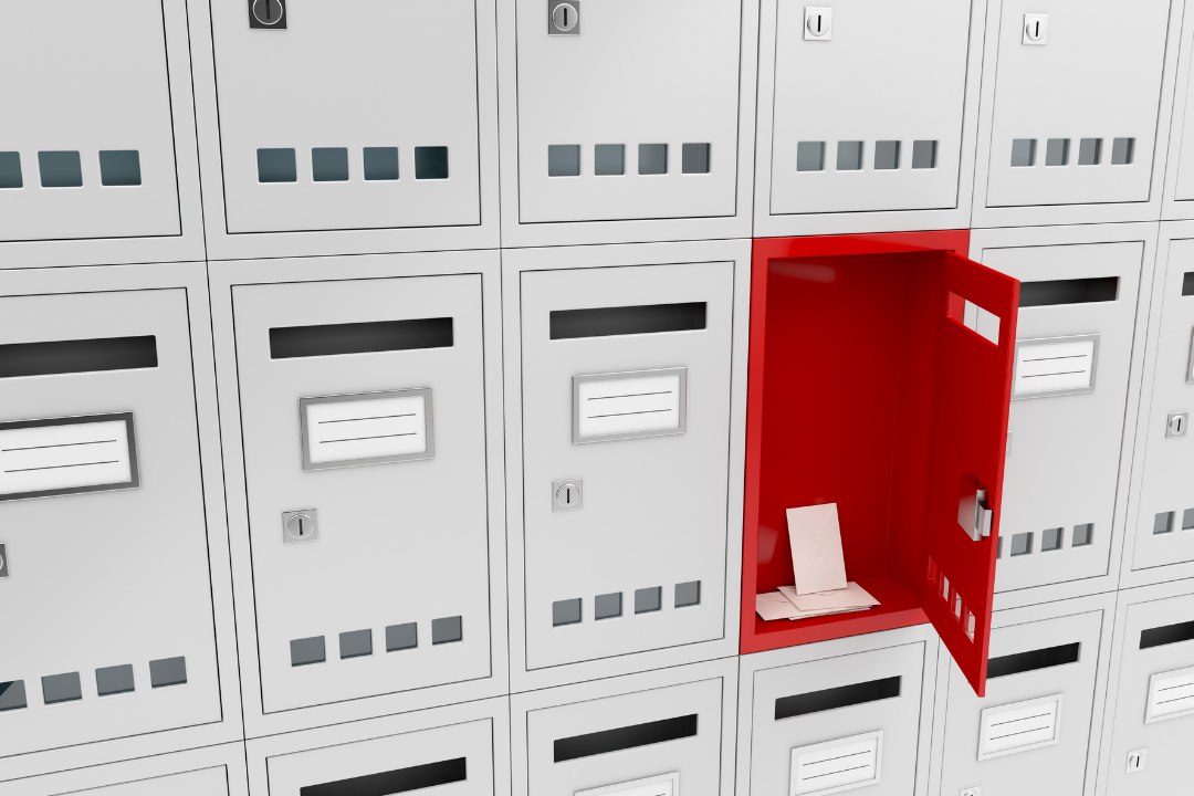 Rows of mailboxes with one opened with letter mail inside